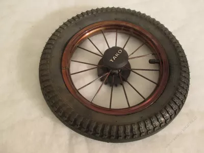 Kolečko ke kočárku TAKO kovové nafukovací hnědé 12" - s ložiskem.