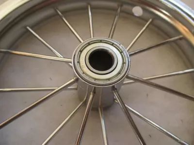 Ráfek kolečka chromovaný 10" - s ložiskem.