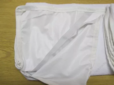 Podložka pod prostěradlo 140 x 70.